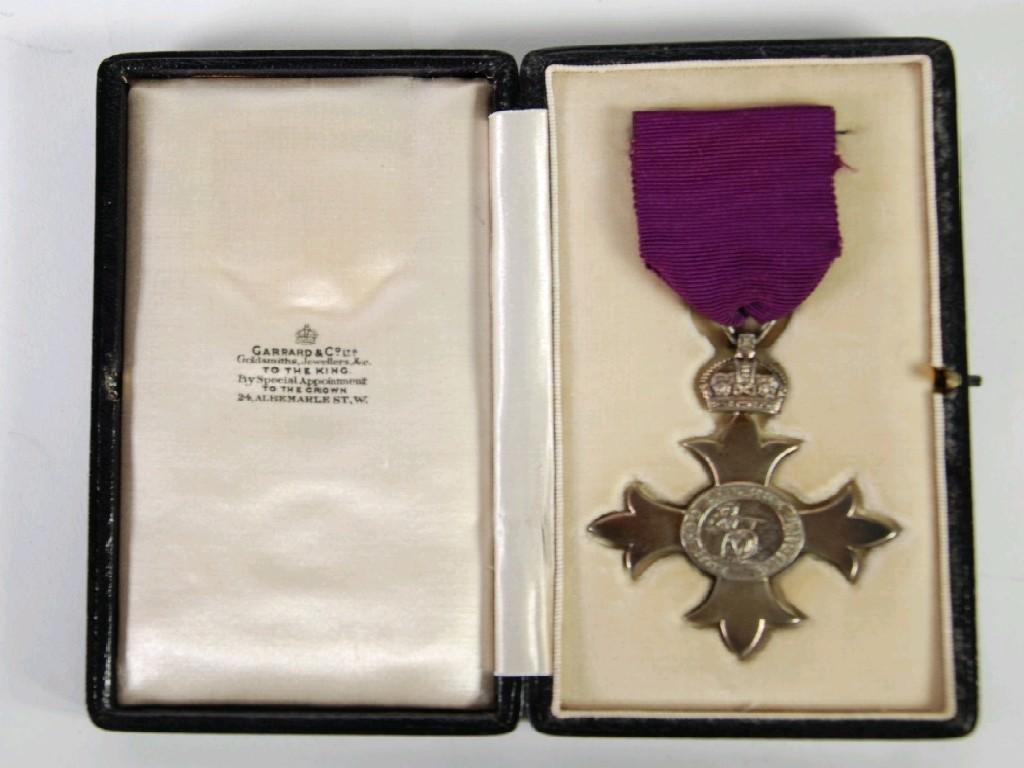 Appraisal: GEORGE V M B E silver metallic with purple ribbon