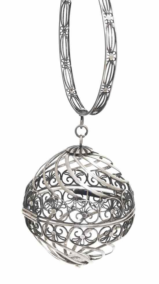 Appraisal: A Federal Silvered Ball Purse having a circular pierced bracelet