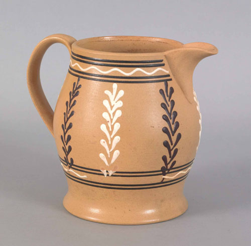 Appraisal: Yelloware pitcher th c with slip decoration h