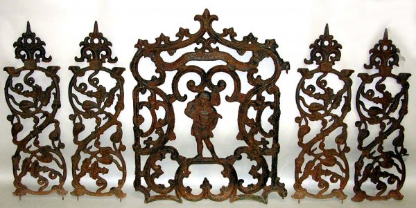 Appraisal: Victorian cast iron fence with figural gate An overall length