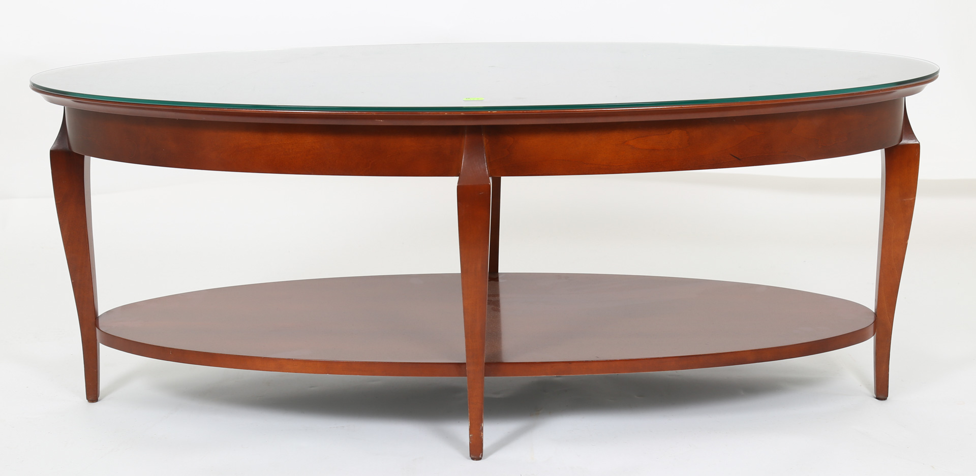 Appraisal: Oval glass top coffee table