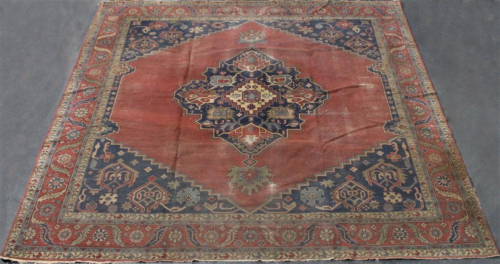 Appraisal: ANTIQUE LARGE HERIZ SERAPI RUG central motif on a deep