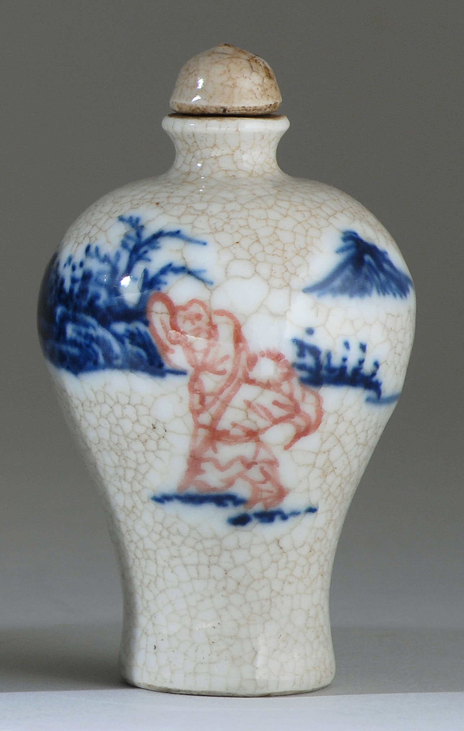 Appraisal: UNDERGLAZE RED AND BLUE PORCELAIN SNUFF BOTTLE th CenturyIn meiping