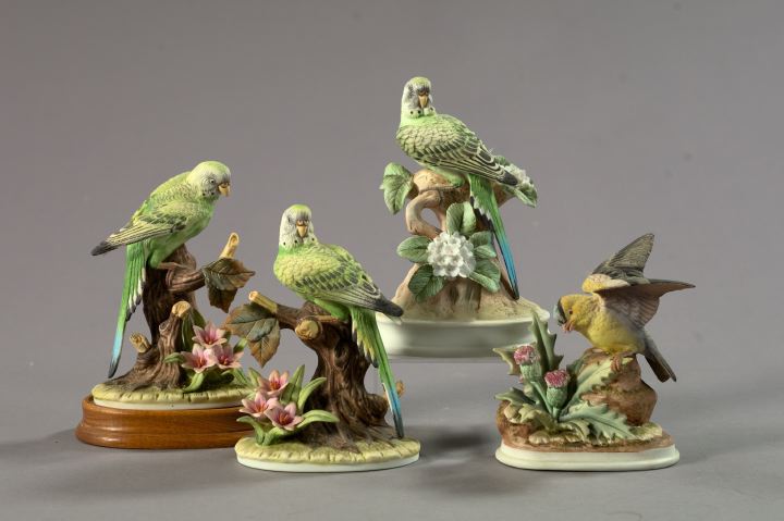 Appraisal: Four Hand-Painted Porcelain Figural Groups consisting of three examples by