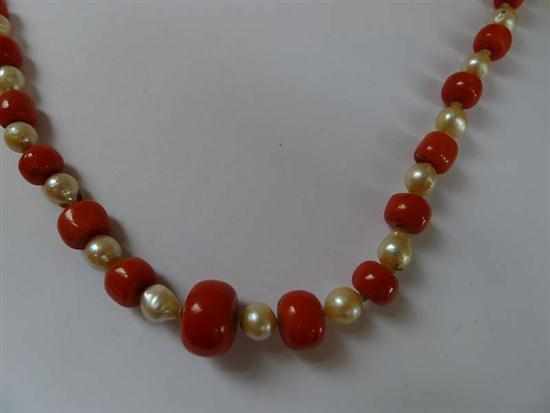 Appraisal: A STRAND OF CORAL BEADS ALTERNATING WITH BAROQUE CULTURED PEARLS