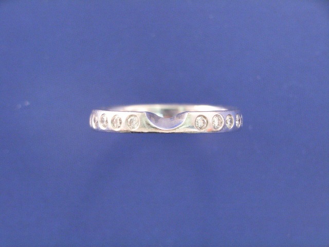 Appraisal: A platinum ten diamond set wedder ring size G gms