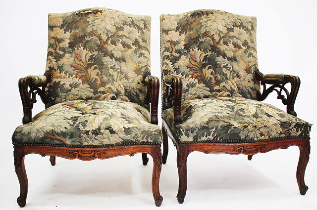 Appraisal: A PAIR OF FRENCH OAK FRAMED AND TAPESTRY UPHOLSTERED ARMCHAIRS