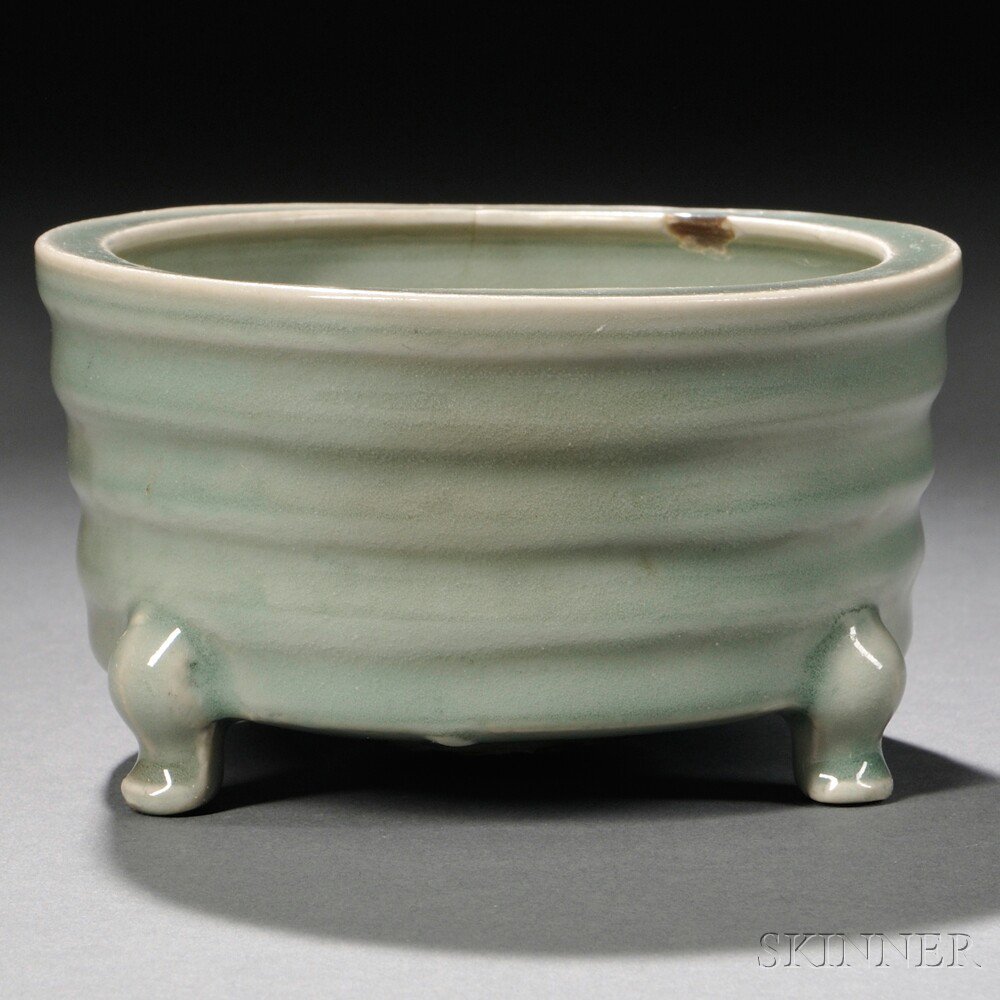 Appraisal: Celadon Tripod Censer China Song Dynasty style the cylindrical body