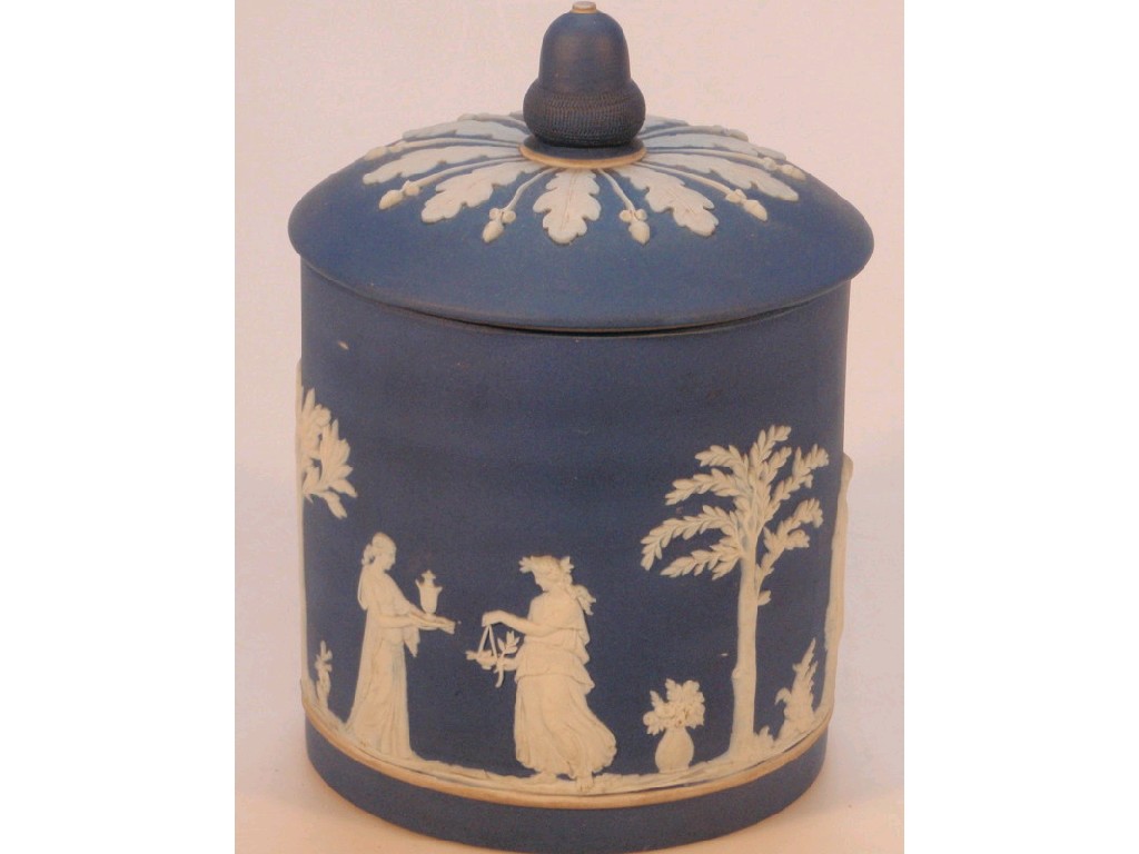 Appraisal: A Wedgwood blue Jasperware biscuit jar and cover with acorn