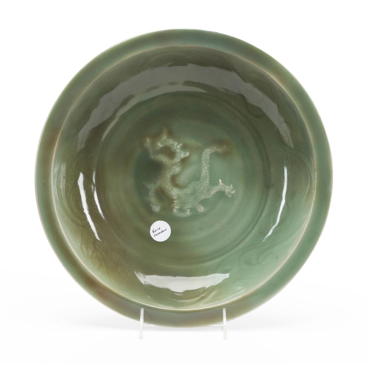 Appraisal: CHINESE LONGQUAN STYLE CELADON DRAGON BOWL Chinese Longquan style celadon