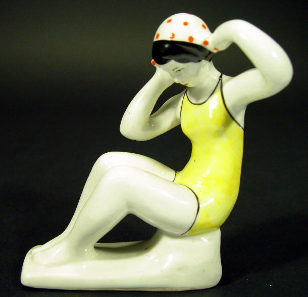 Appraisal: Hand painted USSR porcelain figurine of a bather with polka