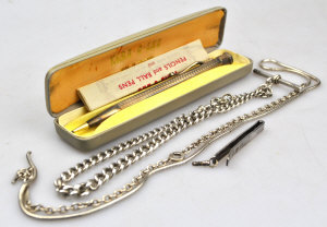 Appraisal: A silver Albert watch chain with swivel and bar a