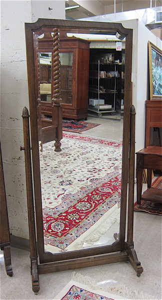 Appraisal: TALL FREESTANDING DRESSING MIRROR American early th century featuring a