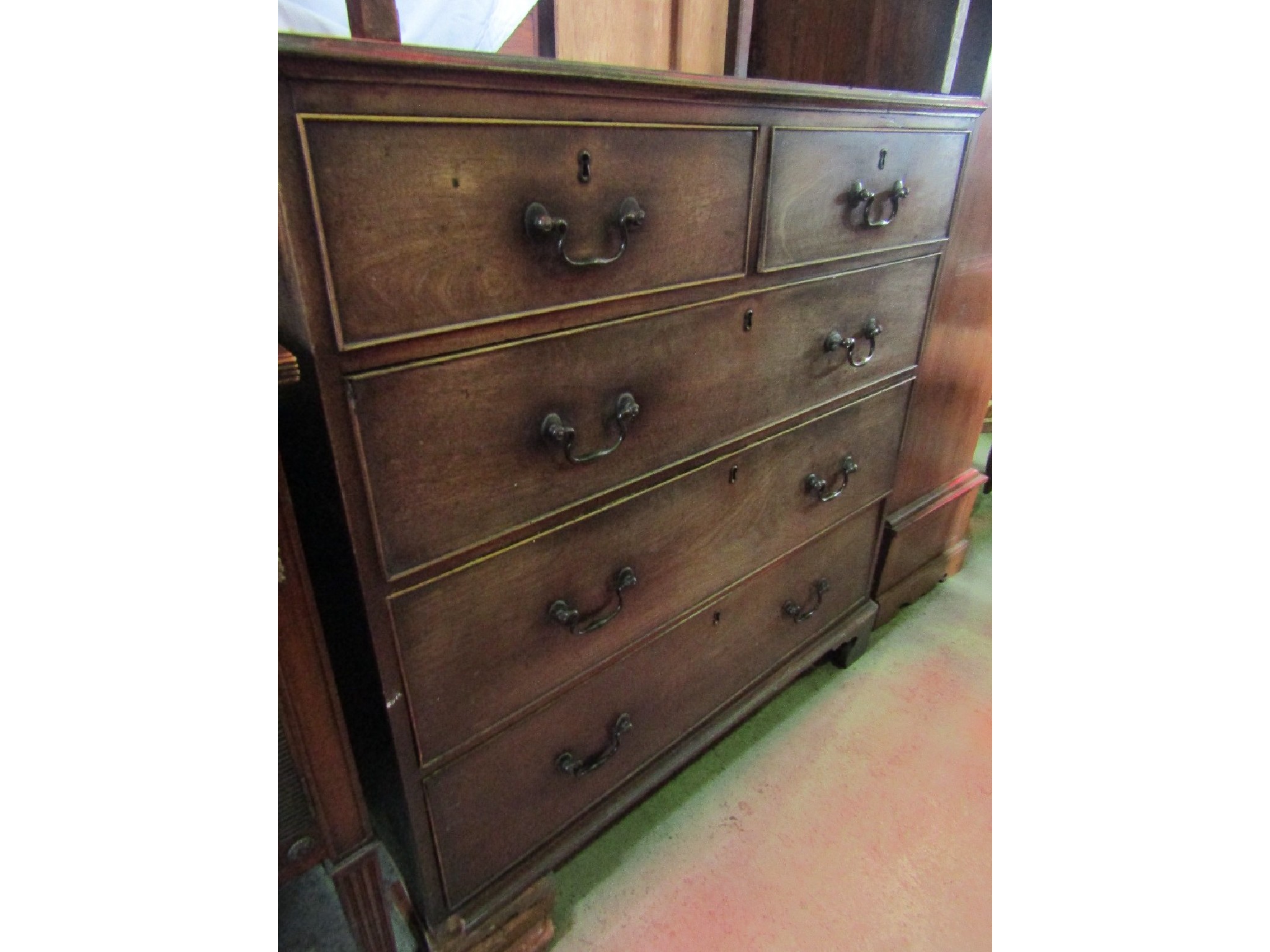 Appraisal: A Georgian mahogany bedroom chest of three long and two