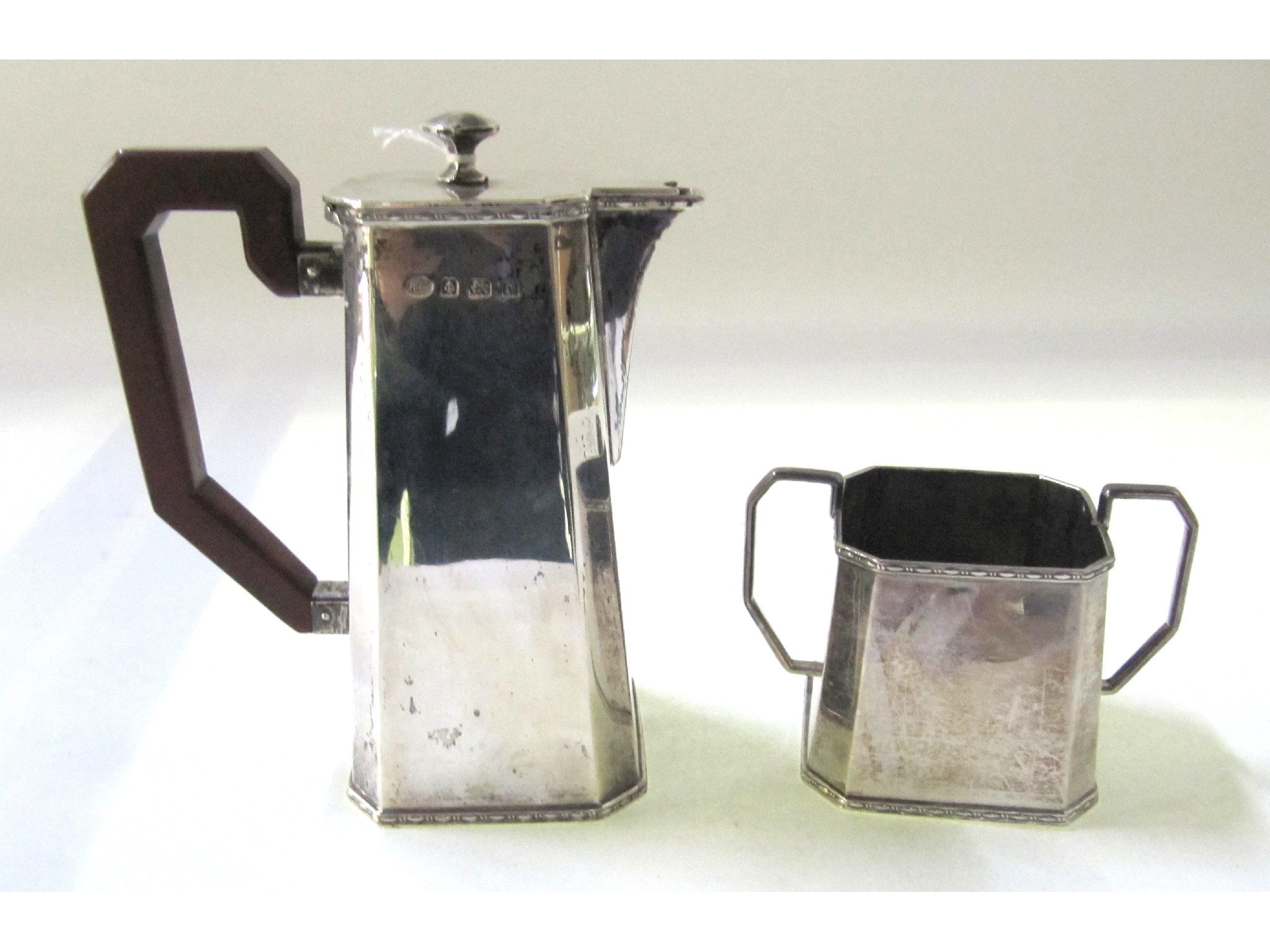 Appraisal: A silver coffee pot with matching sugar bowl Birmingham