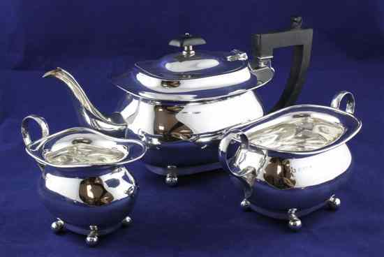 Appraisal: A George V silver three piece tea set of plain