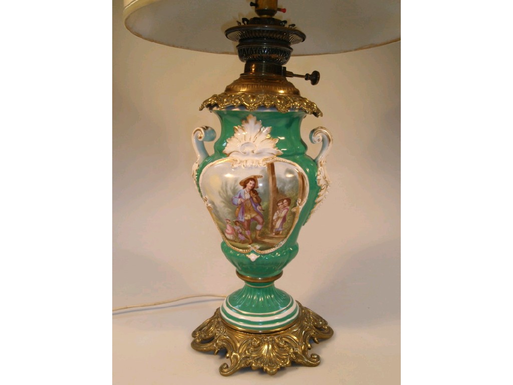 Appraisal: A porcelain and gilt metal table lamp modelled as an