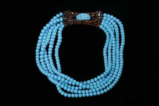 Appraisal: FIVE-STRAND TURQUOISE COLORED GLASS BEAD NECKLACE With amber colored beaded