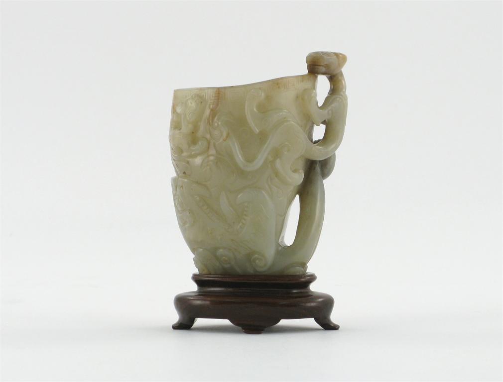 Appraisal: A Chinese celadon coloured jade libation cup