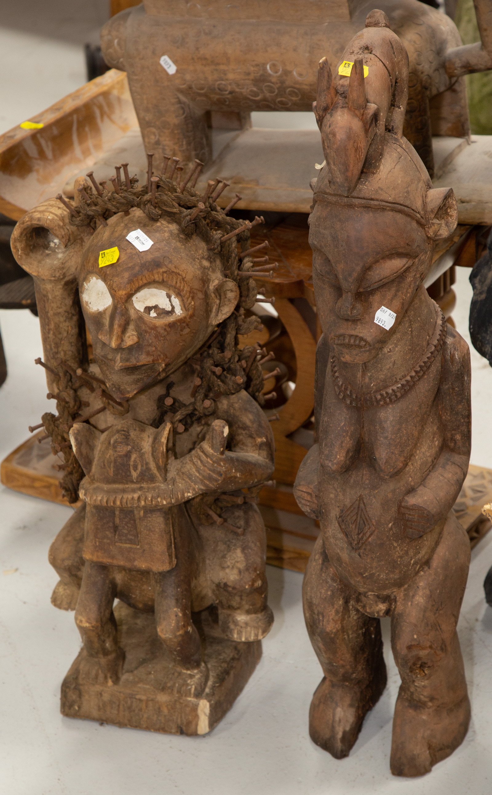 Appraisal: TWO AFRICAN CARVED WOODEN SCULPTURES th century including Kongo style