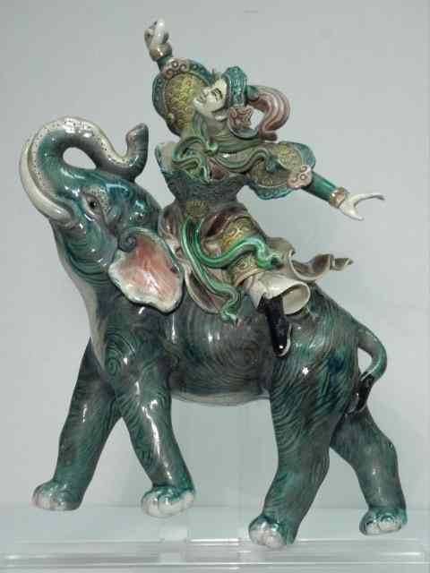 Appraisal: Chinese porcelain figural roof tile Depicts a decorative Chinese man