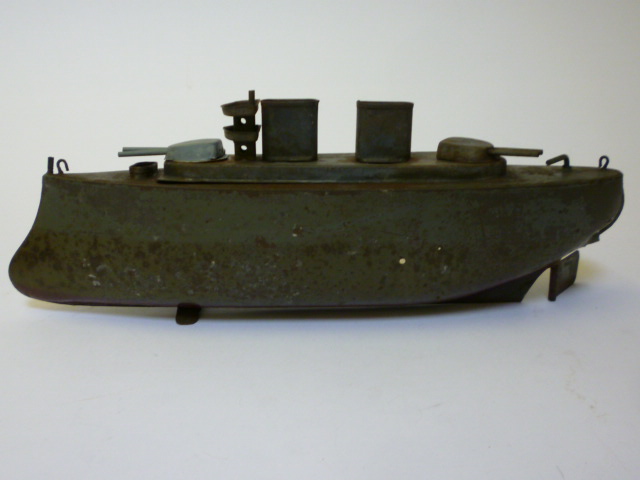 Appraisal: A Sutcliffe Toys early battleship c heavy tin plate spirit