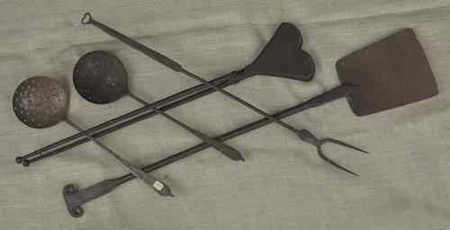 Appraisal: Wrought iron hearth tools to include a peel a waffle