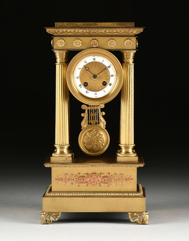 Appraisal: A CHARLES X STYLE GILT LACQUERED METAL PORTICO CLOCK LATE