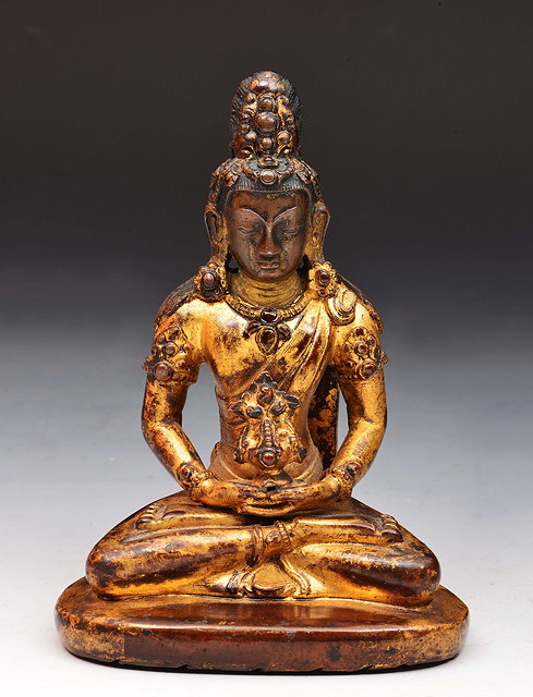 Appraisal: A Tibetan gilt bronze figure of Amitayus th th Centuryseated