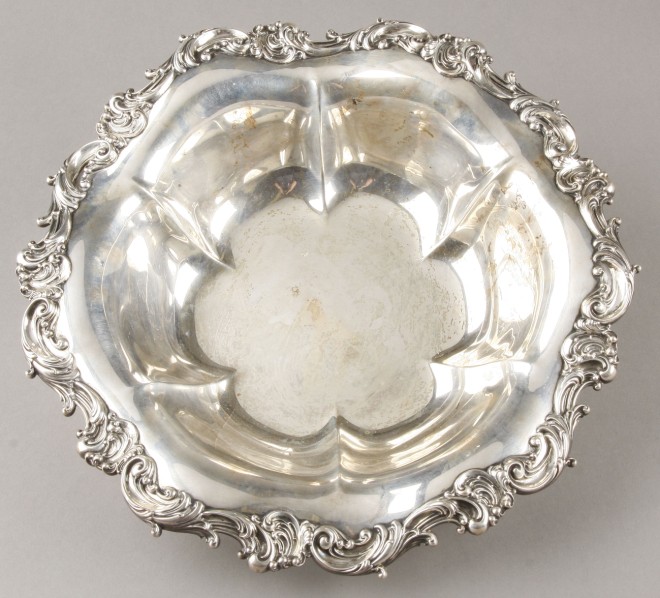 Appraisal: Bowl features decoration scroll rim inscribed on base Presented by