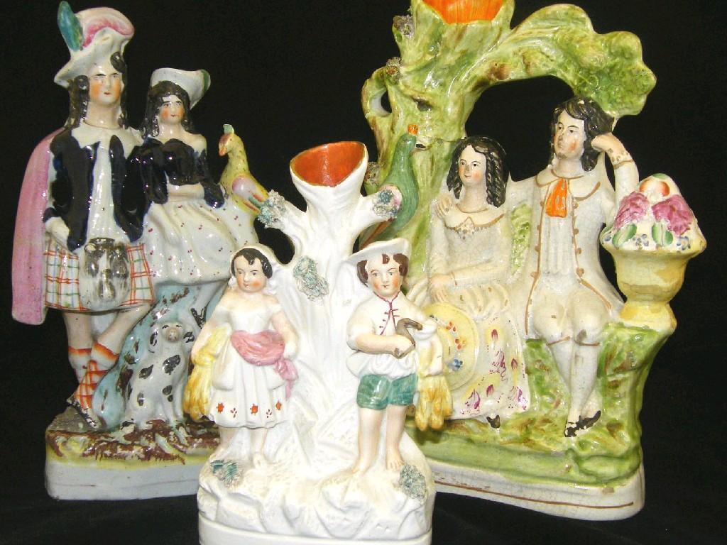 Appraisal: Victorian flatback Staffordshire group modelled with a Highland couple with