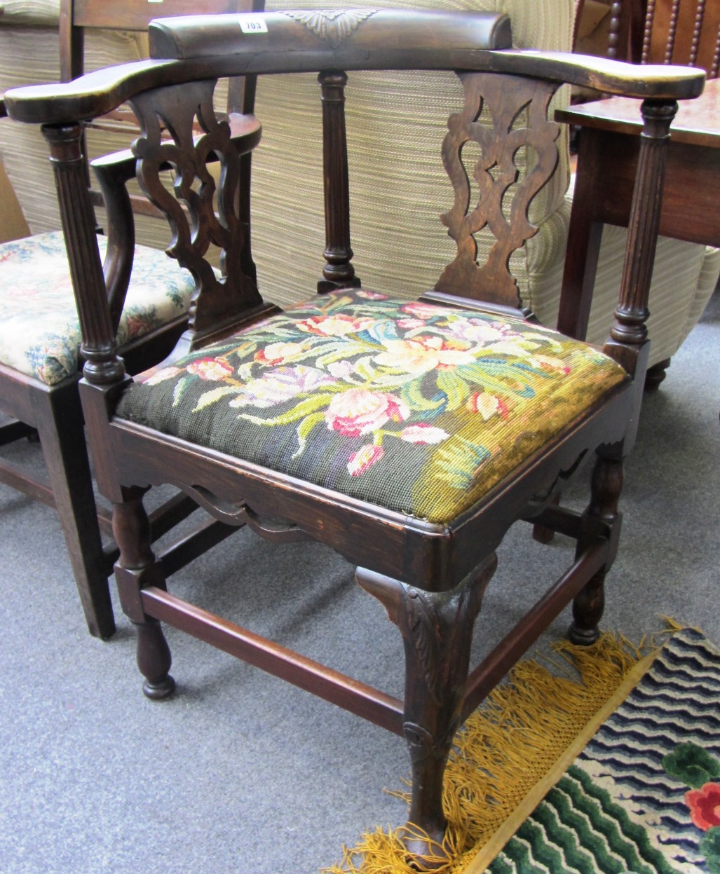 Appraisal: An th century walnut double splat back corner chair on