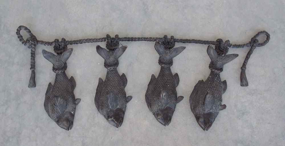 Appraisal: UNIQUE CAST METAL FISH COAT HOOK Decorative cast metal with