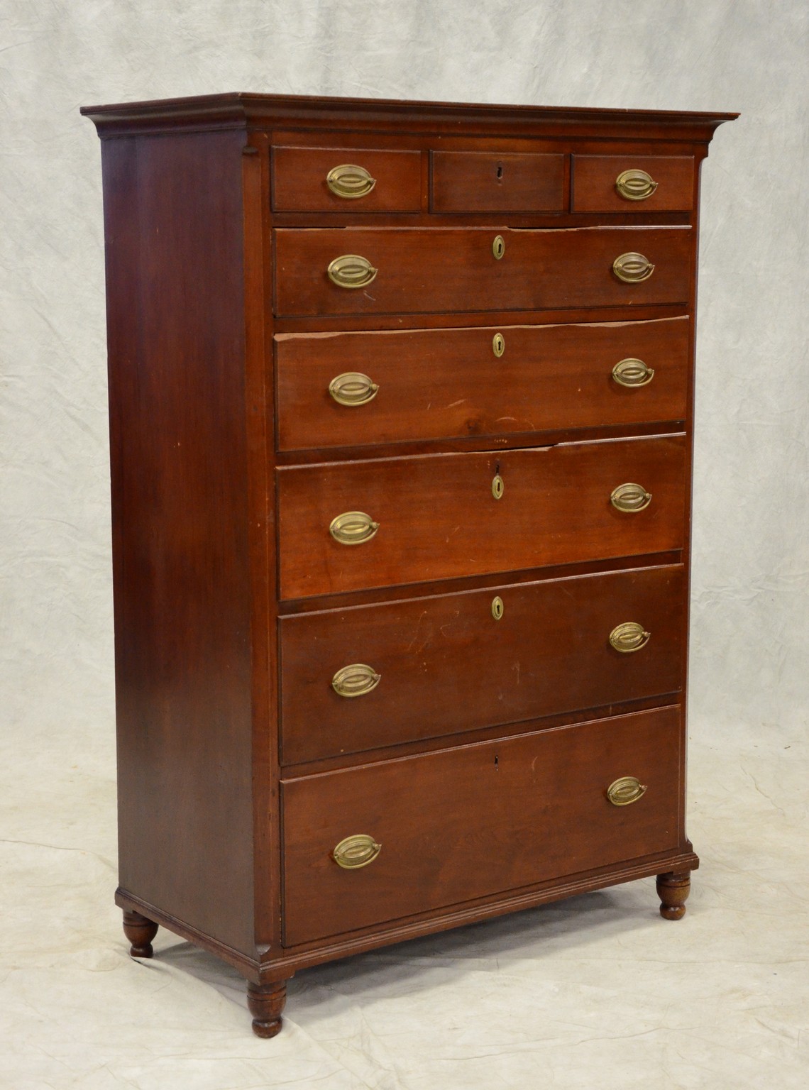 Appraisal: Walnut Hepplewhite over tall chest of drawers replaced brasses damage