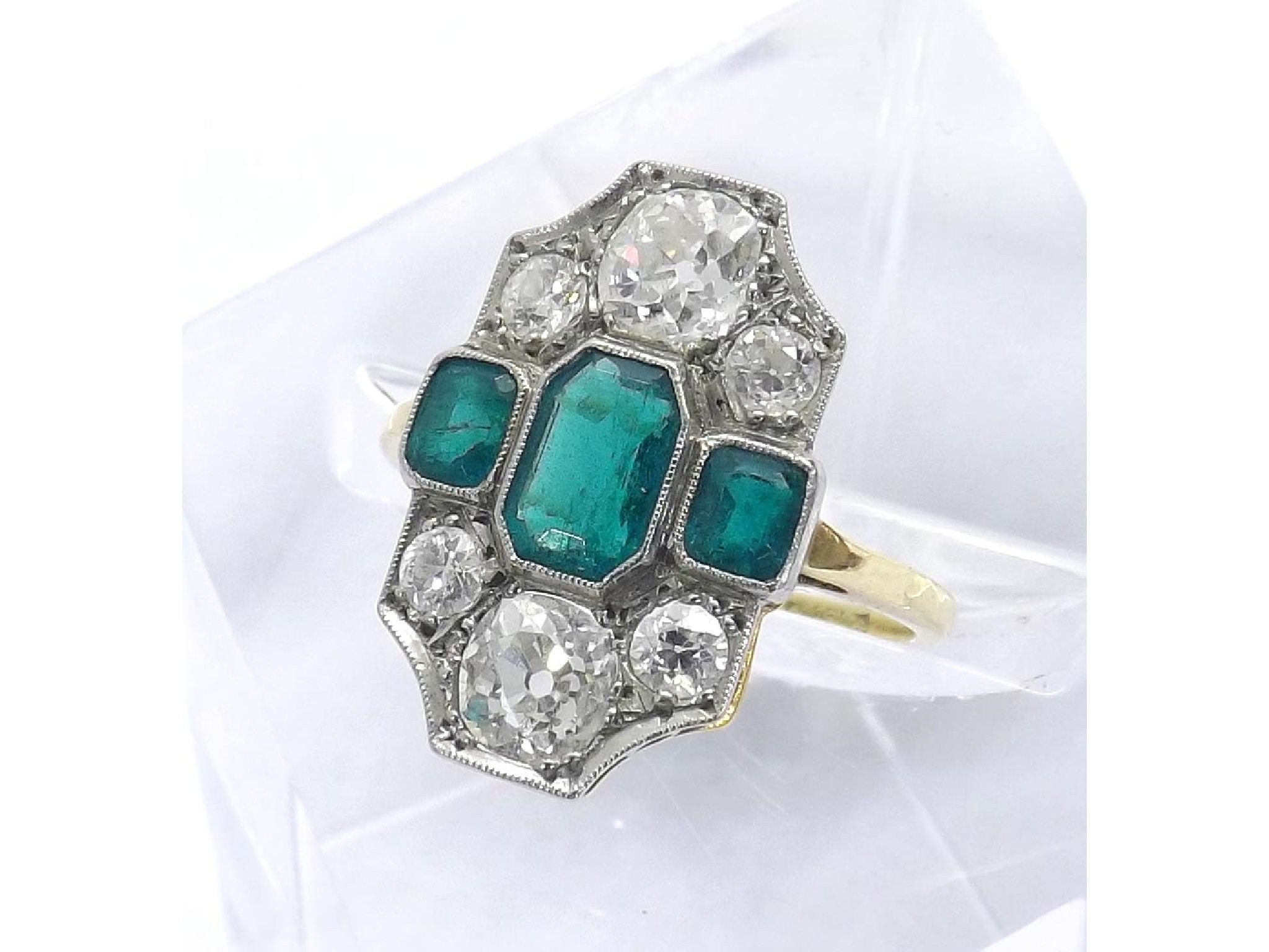 Appraisal: Good ct and platinum Art Deco emerald and diamond cluster