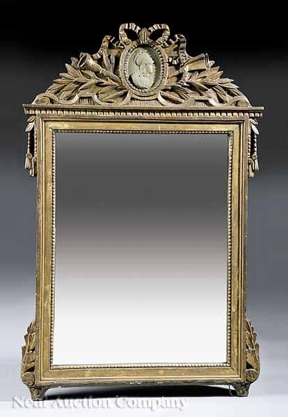 Appraisal: An Antique Neoclassical Carved Giltwood Mirror th c carved crest