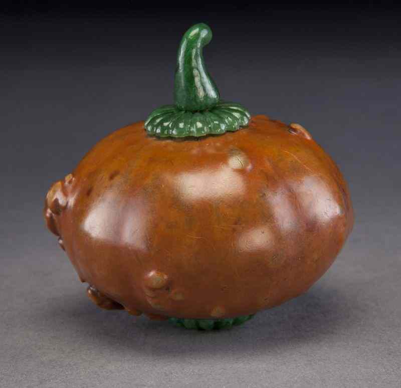 Appraisal: Chinese Qing molded gourd snuff bottle with spinach green inlay