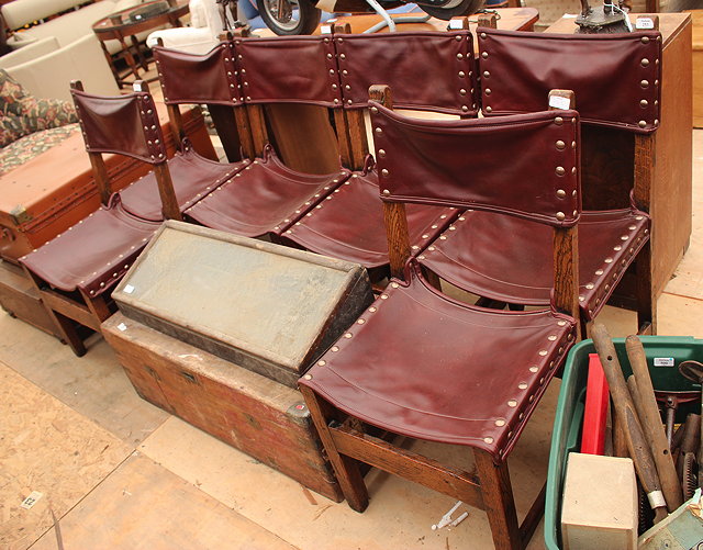 Appraisal: A SET OF SIX OAK DINING CHAIRS with red leather