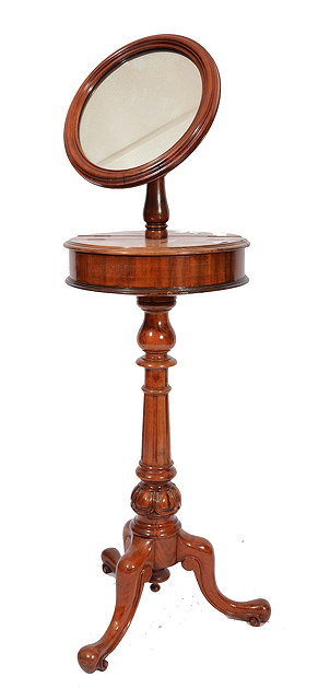 Appraisal: A VICTORIAN MAHOGANY GENTLEMANS SHAVING STAND with circular mirror hinged