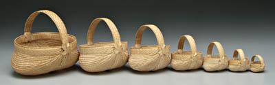 Appraisal: Nest of seven oak split baskets finely woven attributed to