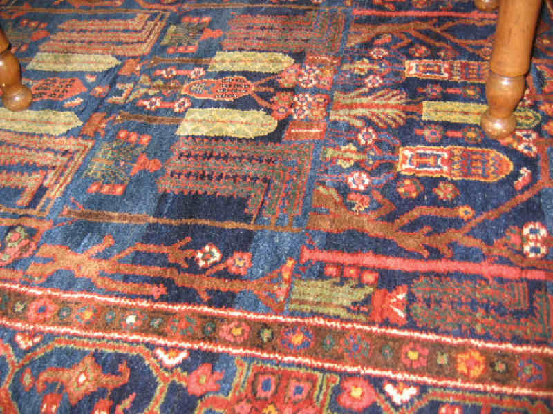 Appraisal: BAKHTIARI THROW RUG The indigo field shows an allover pattern