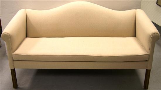 Appraisal: Camelback sofa Chippendale style with molded legs cream upholstery ''