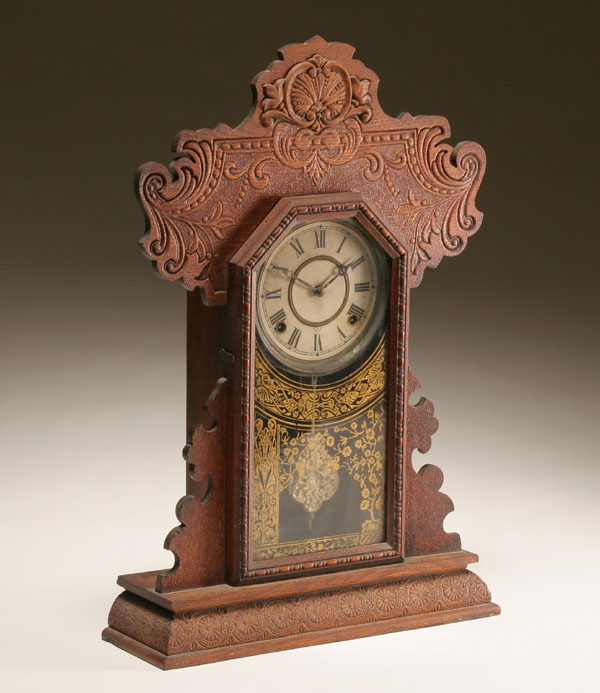 Appraisal: Oak Ingraham gingerbread kitchen clock Minerva model with gilt trimmed