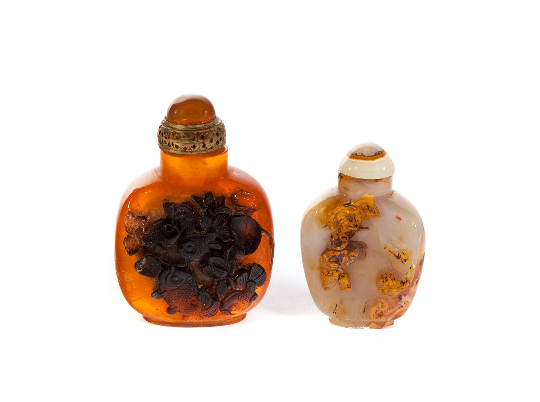 Appraisal: TWO SNUFF BOTTLES Asian th century Carved agate with variations