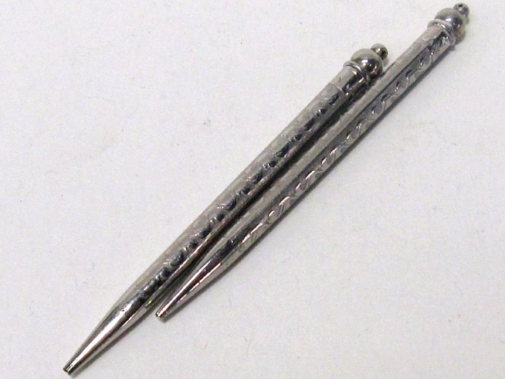 Appraisal: Lot comprising two Japanese white metal pencils