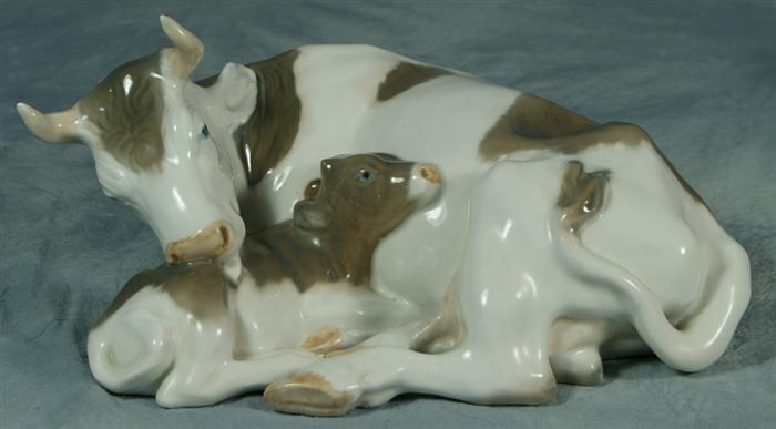 Appraisal: Royal Copenhagen figurine cow with calf no damage long Estimate