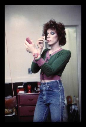 Appraisal: NAN GOLDIN b KENNY PUTTING ON MAKEUP Photograph in colors