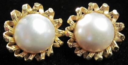 Appraisal: karat yellow gold mabe pearl earrings Twisted 'ribbon' surround