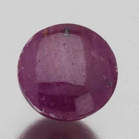 Appraisal: UNMOUNTED CARAT RUBY CABOCHON Round cabochon medium transluscent dark red