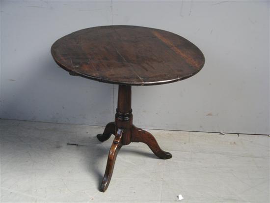 Appraisal: George III oak tilt top table on column support and